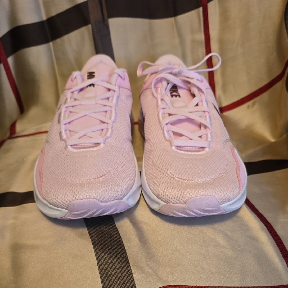 Nike Legend Essential 3 in Pink Foam and Dark Team Red